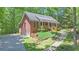 Charming brick home featuring a welcoming front porch and a convenient two-car garage at 150 Gill Ln, Stockbridge, GA 30281