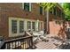 Brick house back deck with outdoor seating and privacy fence at 1735 Peachtree Ne St # 624, Atlanta, GA 30309