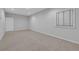 Unfinished basement with a window for natural light, plus access to storage and utilities at 1735 Peachtree Ne St # 624, Atlanta, GA 30309
