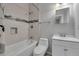 Cozy bathroom features a shower/tub, stylish tile, modern fixtures, and a single vanity at 1735 Peachtree Ne St # 624, Atlanta, GA 30309