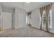 Neutral bedroom with plush carpeting, large windows, and natural light at 1735 Peachtree Ne St # 624, Atlanta, GA 30309