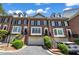 Charming brick townhome with well-maintained landscaping, private entrances, and attached garages at 1735 Peachtree Ne St # 624, Atlanta, GA 30309