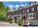 Attractive brick townhomes with manicured landscaping, private entries, and garage parking at 1735 Peachtree Ne St # 624, Atlanta, GA 30309
