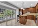Bright eat-in kitchen with an island, granite counters, and stainless steel appliances at 1735 Peachtree Ne St # 624, Atlanta, GA 30309