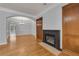 Living room featuring hardwood floors, a fireplace, and built-in wooden cabinetry at 1735 Peachtree Ne St # 624, Atlanta, GA 30309