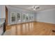 Bright living room with multiple windows and doors opening to the outside at 1735 Peachtree Ne St # 624, Atlanta, GA 30309
