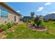 Charming backyard featuring a well-maintained lawn and a quaint shed, perfect for outdoor enjoyment at 64 Citadel Dr, Hampton, GA 30228