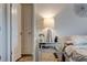 Stylish bedroom detail showcasing a mirrored nightstand and a lamp, creating a cozy ambiance at 64 Citadel Dr, Hampton, GA 30228