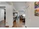 Hallway view showing the open floorplan, with access to the kitchen and living room at 64 Citadel Dr, Hampton, GA 30228