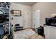 Well-organized mud room with storage shelves, a patterned rug, and access to the main house at 64 Citadel Dr, Hampton, GA 30228