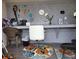Functional office area with a pegboard wall, ample desk space, and modern accents at 64 Citadel Dr, Hampton, GA 30228