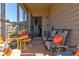 Inviting screened porch with outdoor furniture, offering a perfect spot for relaxation and entertainment at 64 Citadel Dr, Hampton, GA 30228