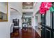Grand foyer with gleaming hardwood floors and an open staircase, creating an inviting entrance at 7115 Secret Rose, Douglasville, GA 30134