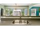 Close-up of the kitchen sink showcasing the countertops and view to the dining area at 7115 Secret Rose, Douglasville, GA 30134