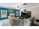 Spacious living room with a cozy fireplace and a large sectional sofa, ideal for Gathering gatherings at 7115 Secret Rose, Douglasville, GA 30134