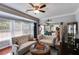 Spacious living room area featuring hardwood floors and great natural light throughout at 7115 Secret Rose, Douglasville, GA 30134