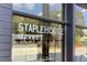 Close-up exterior view of the Staplehouse Market signage on a window at 1261 Caroline Se St # 108, Atlanta, GA 30307
