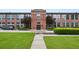 Charming brick exterior with manicured landscaping, sidewalk, and entrance at 1261 Caroline Se St # 108, Atlanta, GA 30307
