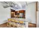 Open kitchen with granite countertop island and stainless steel appliances at 1261 Caroline Se St # 108, Atlanta, GA 30307