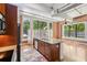 Open kitchen featuring stainless appliances, granite countertops, and hardwood flooring at 1261 Caroline Se St # 108, Atlanta, GA 30307