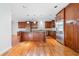 Spacious kitchen with cherry cabinets, granite countertops, and stainless steel appliances at 1905 Castleway Ne Ln, Atlanta, GA 30345
