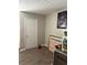 This is a bedroom with gray walls, a closet door, and a hardwood floor at 3464 Kingswood Trl, Decatur, GA 30034