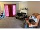 The living room has carpet, a fireplace, pink curtains, and a TV on a coffee table at 3464 Kingswood Trl, Decatur, GA 30034