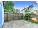 The backyard features a wood fence, landscaping, and concrete patio at 3468 Washington Way, Doraville, GA 30340