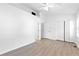 Bright bedroom with wood floors, closet, and a window, offering ample space at 3468 Washington Way, Doraville, GA 30340