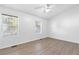 Bright and airy bedroom with wood flooring, neutral walls, and natural light at 3468 Washington Way, Doraville, GA 30340