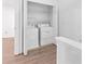 Convenient laundry area with a washer and dryer on the upper floor at 3468 Washington Way, Doraville, GA 30340