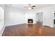 Spacious living room featuring hardwood floors, fireplace, and abundant natural light at 3468 Washington Way, Doraville, GA 30340