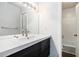 Clean bathroom featuring a modern vanity, large mirror, and a shower-tub combination at 1151 Rankin St # 20A, Stone Mountain, GA 30083