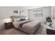 Comfortable bedroom with a large window, plush bed, and contemporary decor at 1151 Rankin St # 20A, Stone Mountain, GA 30083