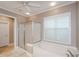 Lovely bathroom with a large tub and separate shower at 1460 Badingham Dr, Cumming, GA 30041