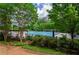 Beautiful community pool offering a refreshing escape with ample lounge seating and shade, perfect for summer relaxation at 1460 Badingham Dr, Cumming, GA 30041