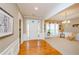 Elegant foyer featuring hardwood floors and views into adjacent living spaces at 1460 Badingham Dr, Cumming, GA 30041