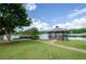Picturesque gazebo overlooking the tranquil lake, offering a serene spot for relaxation and enjoying nature's beauty at 1460 Badingham Dr, Cumming, GA 30041