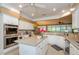 Beautiful kitchen featuring double ovens, an island, and modern appliances for a delightful cooking experience at 1460 Badingham Dr, Cumming, GA 30041
