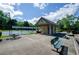 Enjoy the community tennis courts and picnic area on a sunny day, perfect for outdoor recreation and relaxation at 1460 Badingham Dr, Cumming, GA 30041