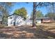 This is a backyard with a beautiful deck and a nice yard at 1887 King Charles Sw Rd, Atlanta, GA 30331