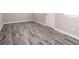 A basement area with tile flooring and white walls at 1887 King Charles Sw Rd, Atlanta, GA 30331