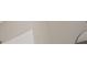 The bathroom space is a clean white space and a large mirror with tile walls at 1887 King Charles Sw Rd, Atlanta, GA 30331