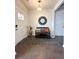 An inviting foyer with hardwood floors, bench seating, and a decorative mirror at 2706 Park Land Ln, Snellville, GA 30078