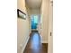 Hallway with view of laundry room at 2706 Park Land Ln, Snellville, GA 30078
