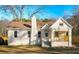 Charming single-story home with a welcoming front porch and nicely maintained landscaping at 5510 Mason Rd, Atlanta, GA 30349