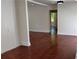 Inviting living area with hardwood floors, neutral paint, and recessed lighting at 5510 Mason Rd, Atlanta, GA 30349