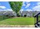 Manicured backyard features lush grass and a privacy fence for outdoor enjoyment at 828 Olmsted Ln, Duluth, GA 30097