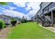 Expansive backyard with lush grass and a spacious patio, perfect for entertaining at 828 Olmsted Ln, Duluth, GA 30097