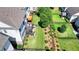Lush backyard includes deck, landscaping, trees, and fenced perimeter at 828 Olmsted Ln, Duluth, GA 30097